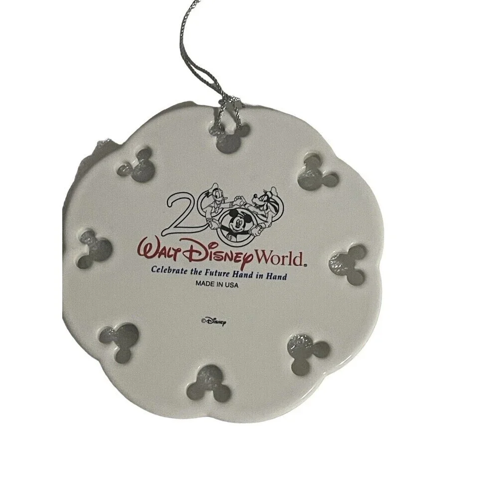 Vintage WALT DISNEY WORLD 2000 Celebrate the Future Hand In Hand Disc Ornament